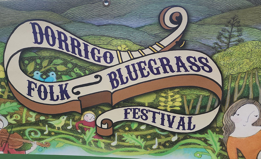 Dorrigo Folk & Bluegrass Festival logo on a folk art style background